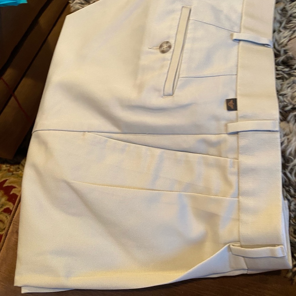 Dockers light beige never iron pants pleated with cuffs